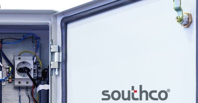 Image of open electrical box, focused on the hinge of the door.